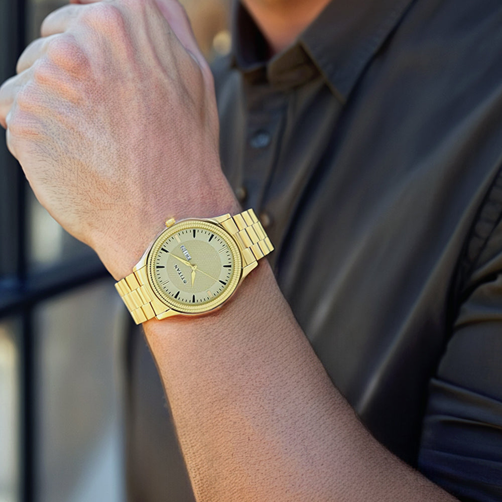 Titan Quartz Analog with Day and Date Champagne Dial Stainless